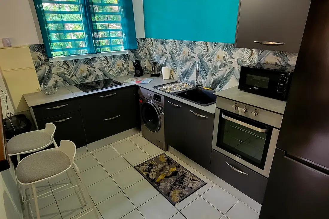 Apartamento do Cayenne Chic com sala e cozinha integradas